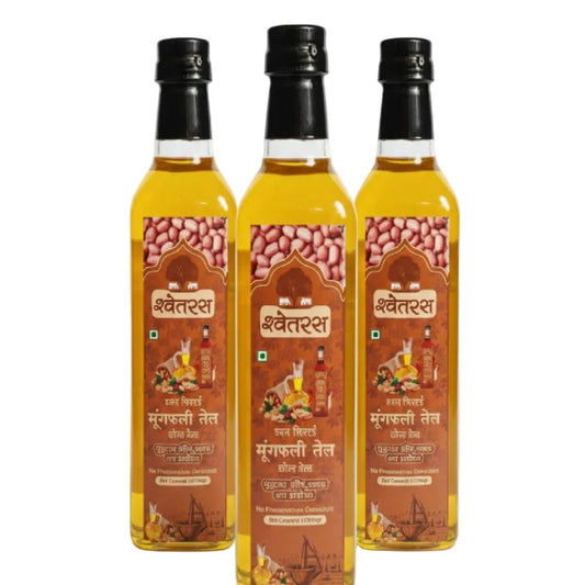 Three bottles of Shweta ground nut oil on a white background